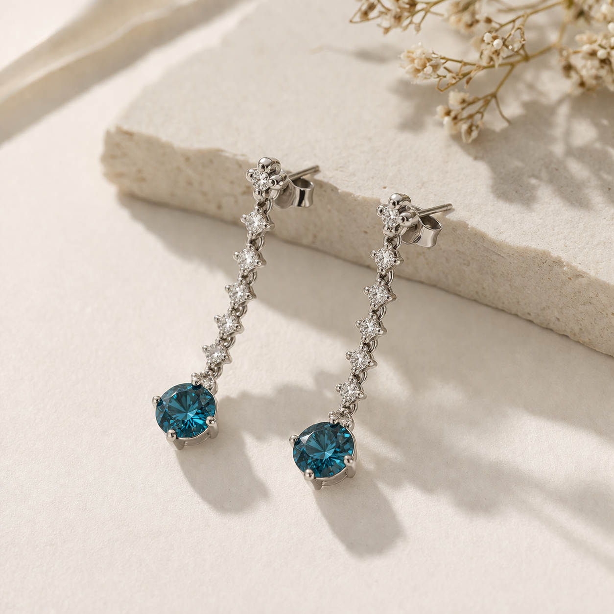 Graduated Blue Diamond Tennis Earrings blue diamond
