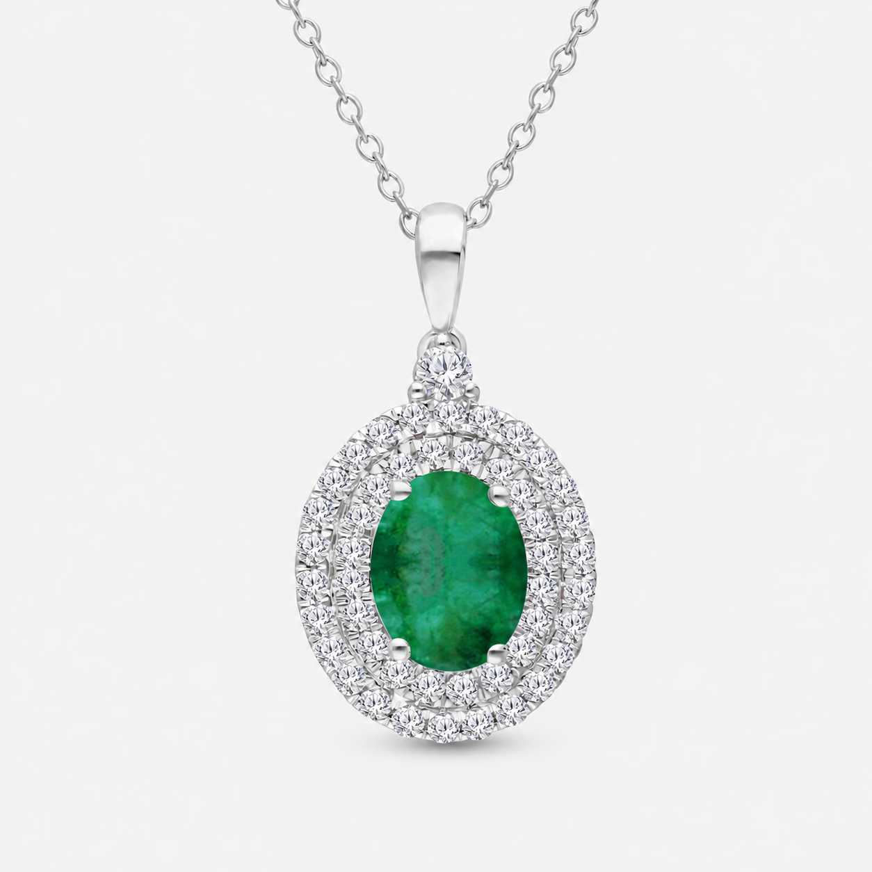 Dual Halo Colombian Emerald Pendant Emerald