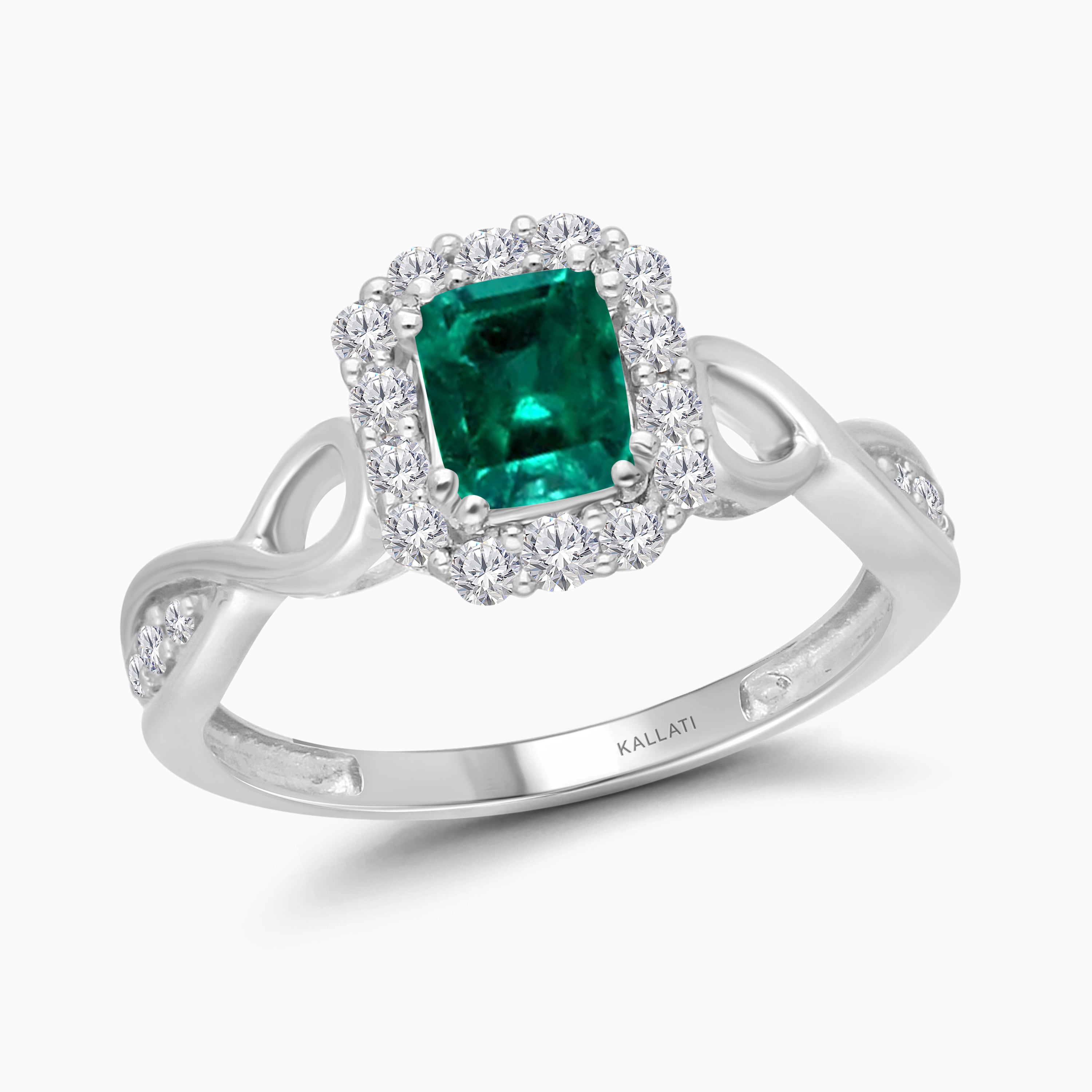 Twisting Colombian Emerald Ring