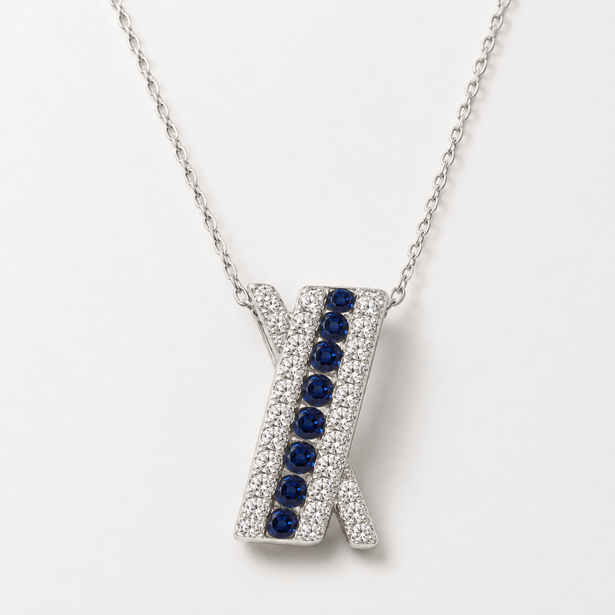 Diamond & Sapphire Crossover Pendant