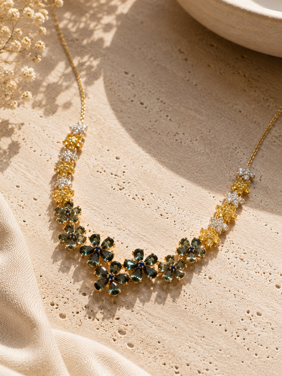 Field of flowers tennis necklace teal sapphire