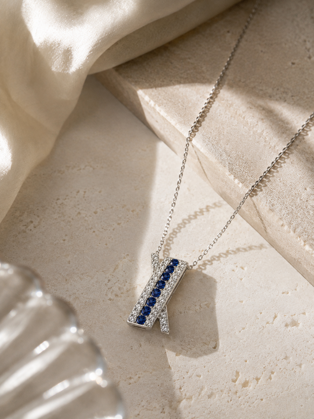 Diamond & Sapphire Crossover Pendant