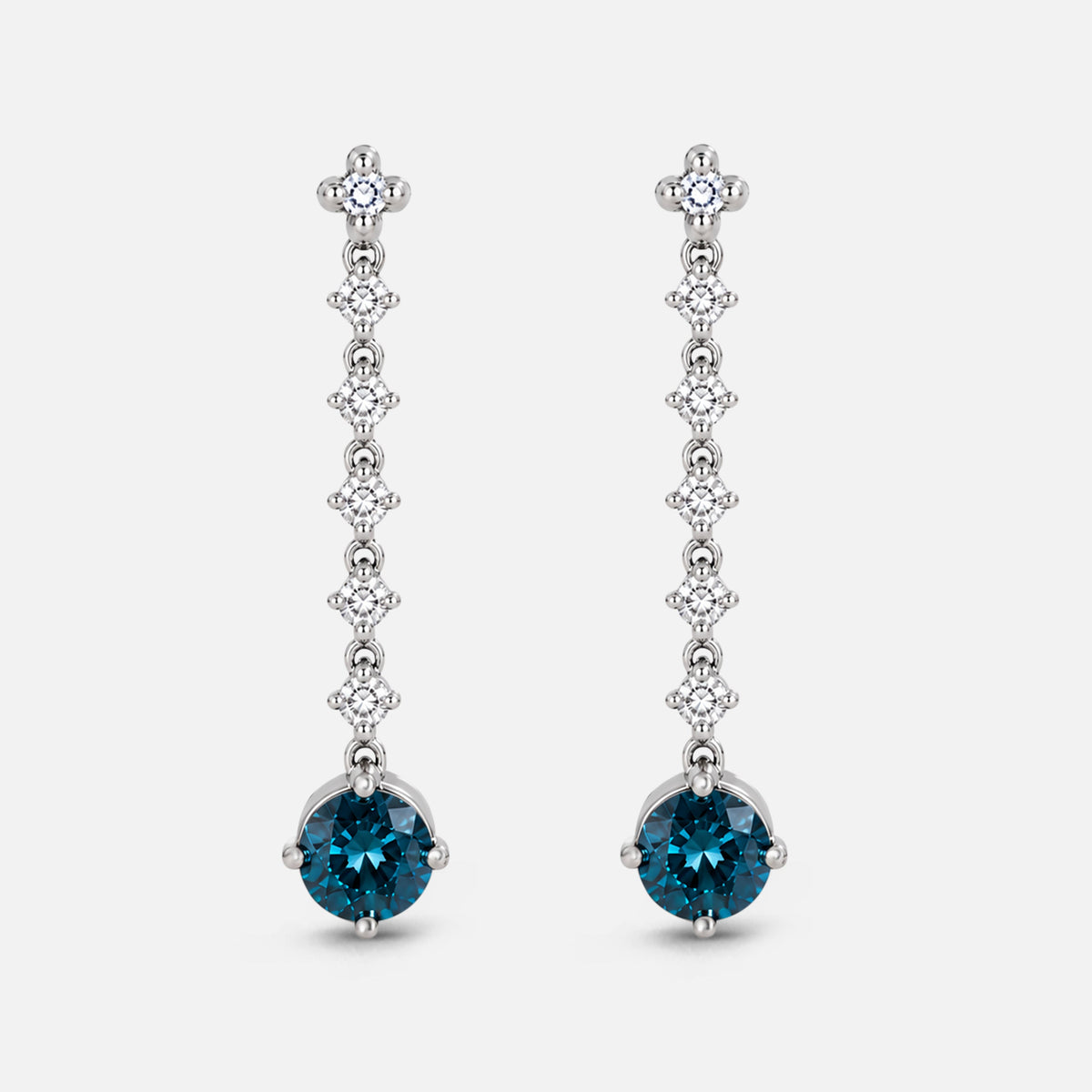 Graduated Blue Diamond Tennis Earrings blue diamond