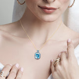 14kt Yellow Gold Blue Topaz with Blue & White Diamond Classic Pendant