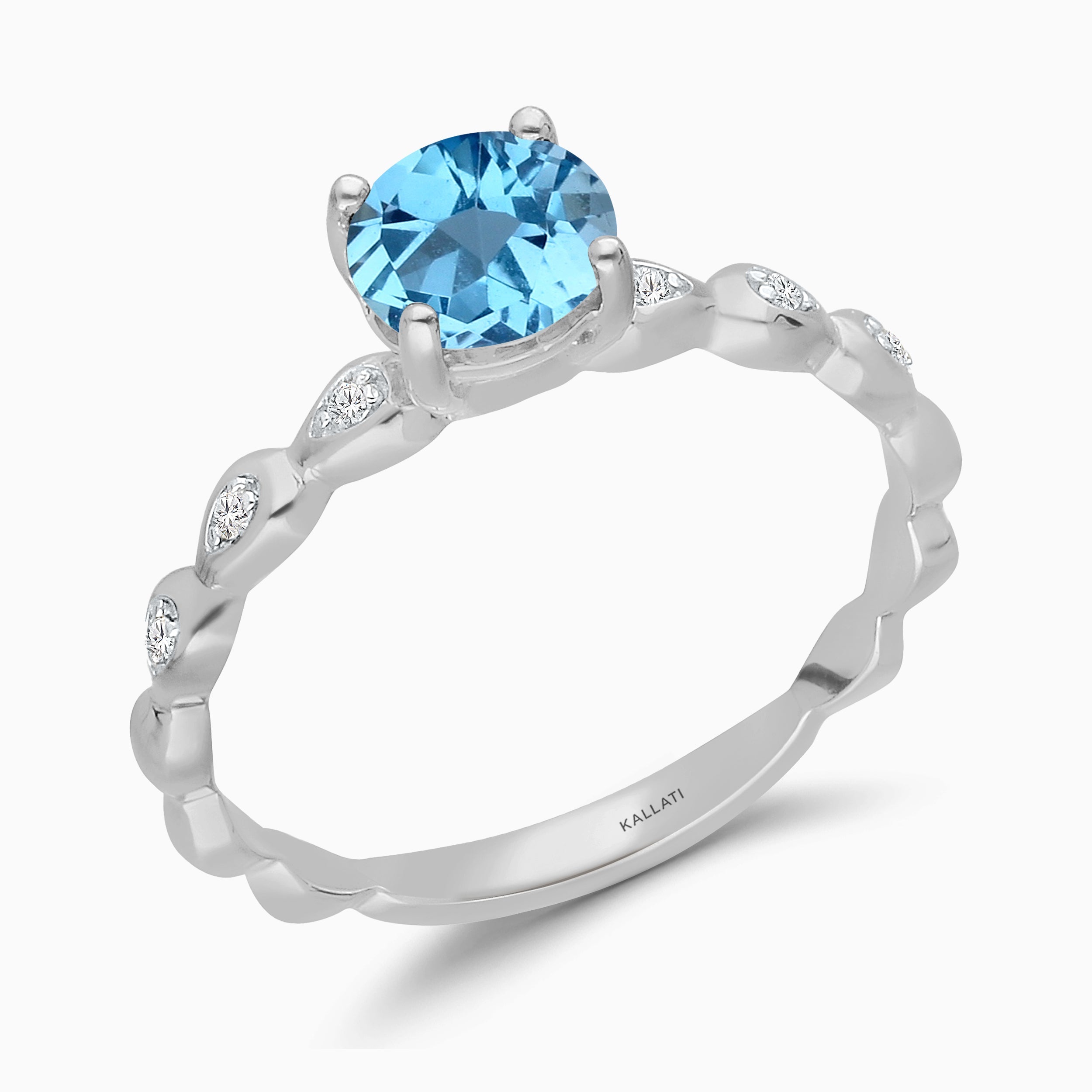 White Gold Blue Topaz and White Diamond Solitaire Ring