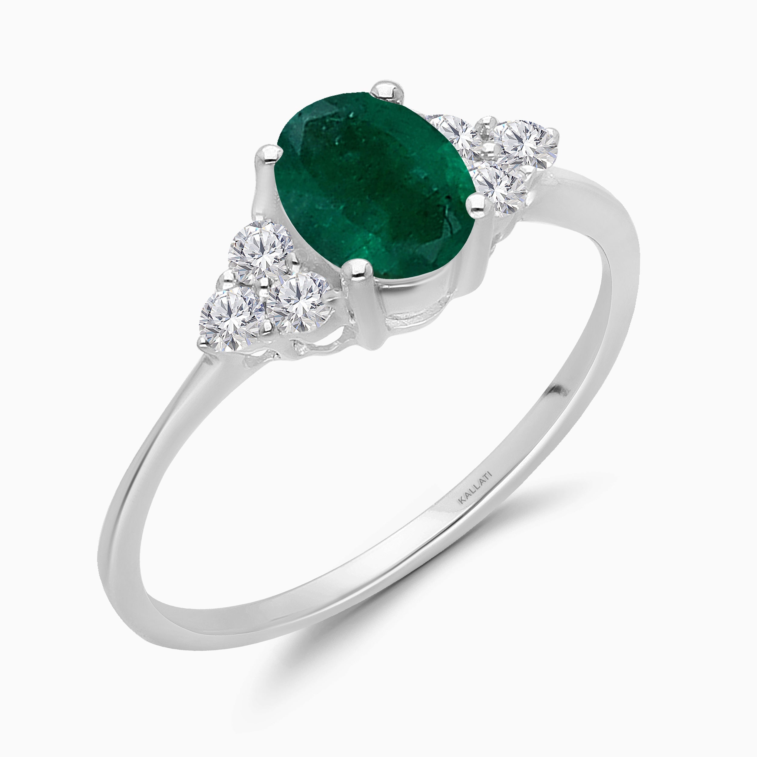 Colombian Emerald and Trio Diamond Ring