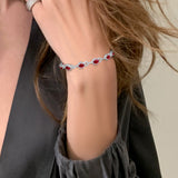 Oval Ruby & Diamond Tennis Bracelet
